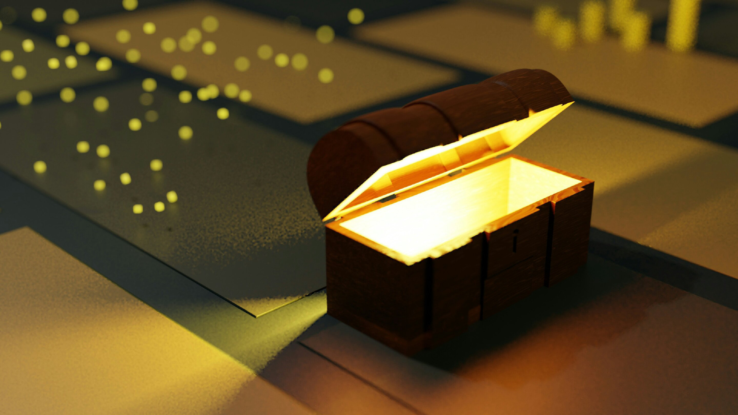 An open wooden treasure chest glowing with bright yellow light.